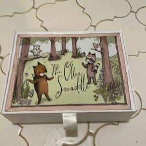 New in box Ollie swaddle